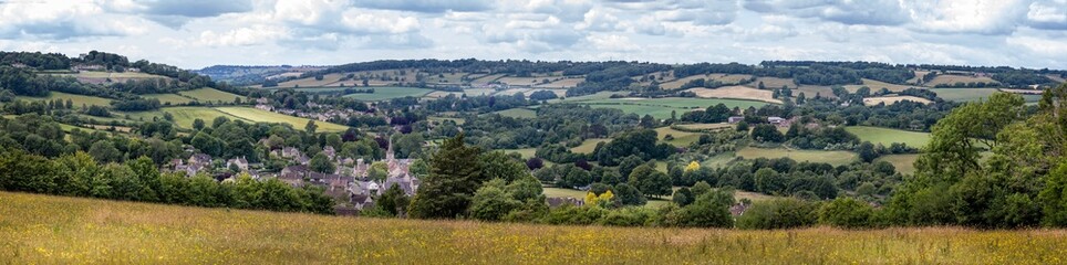 Fototapeta na wymiar Panoramic landscape looking down on the historic village of Box, near Bath in Wiltshire, UK on 7 June 2020