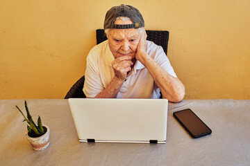 Elderly woman managing her home business