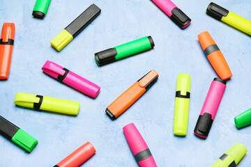 Set of markers on color background