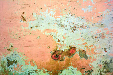 Old grunge messy plaster wall, peels of paint. Rough urban concrete wall texture