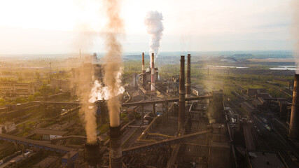 Industry metallurgical plant smoke from pipes mining ecology pollution.