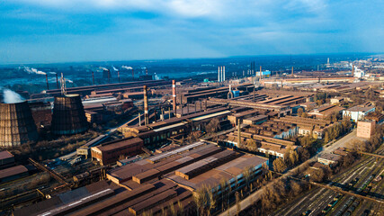 Fototapeta premium metallurgical production plant full cycle smoke from pipes bad ecology aerial photography