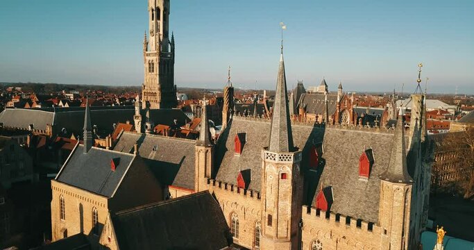 Brugge, Belgium - February 28, 2020: 4K Aerial Footage under the Medieval City Center of Brugge in the Summer Day