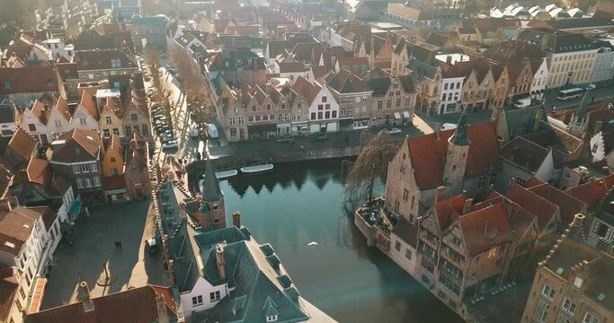 Brugge, Belgium - February 28, 2020: 4K Aerial Footage under the Medieval City Center of Brugge in the Summer Day