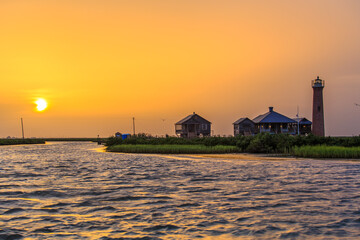 Port Aransas Texas sunset by the lighthouse channel © Tricia
