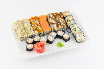 Close-up of traditional Japanese sushi on a white background. Design of the sushi bar menu. Japanese cuisine.
