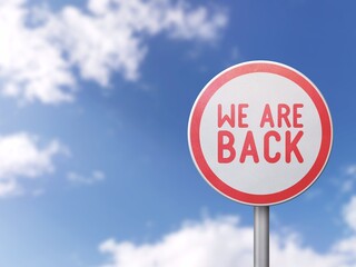 We are back - Road sign on blue sky background