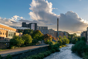 Student housing in Glasgow's West End on the banks of River Kelvin at sunset. Picturesque urban scene.