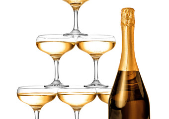 Bottle of champagne and tower made of glasses on white background