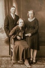 Germany - CIRCA 1920s: Group portrait shot of two female and man in studio. Vintage Art deco era photo