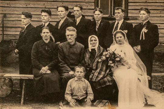 RUSSIA - CIRCA 1920s: Group photo of wedding guests. Vintage historical archive photo