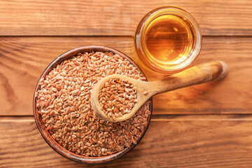 Composition with flax oil on wooden table
