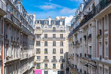 Paris, typical facades and street, beautiful buildings in Montmartre
