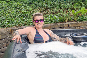 caucasian woman in the hot tub
