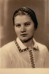 Latvia - CIRCA 1930s: Close up portrait of female in studio, Vintage Art Deco era photo