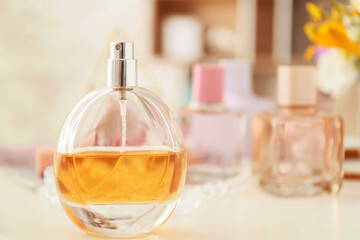 Obraz na płótnie Canvas Perfume and cosmetics on table