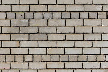 Texture of an old white brick wall