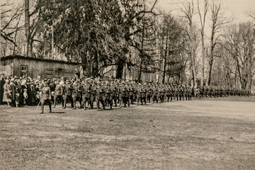 Aliksne Latvia - 1 May 1934: Latvian National Armed Forces parade in Aluksne regarding Convocation of the Constituent Assembly of the Republic of Latvia