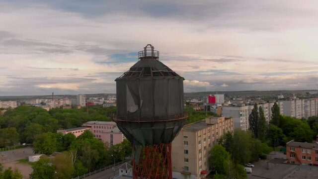 Aerial view of old wooden water tower in small European city
