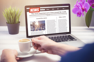 Men reading news on a laptop screen. Mockup website. Newspaper and portal on internet.