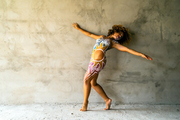 A young woman with body art painting