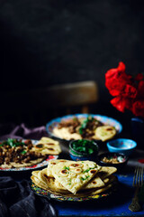 Garlic naan  flatbread, with hummus.