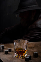 Glass of whiskey and stones