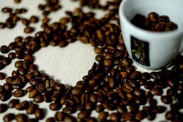 cup of coffee with coffee beans and heart
