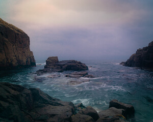 Fototapeta na wymiar Dramatic sea and rocks