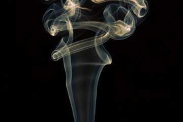yellow smoke on black background