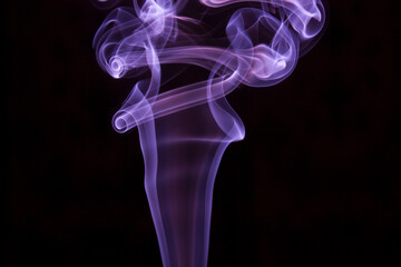 purple smoke on black background