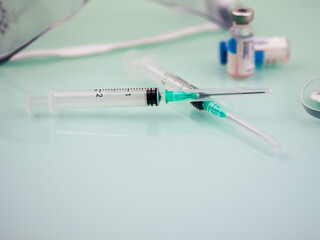 Medicines, injection, vaccines, glasses and face masks, vaccination against viruses.