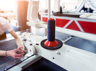 Fabric industry production line. Textile factory. Working tailoring process