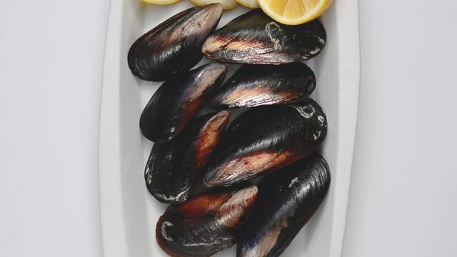 stuffed mussels spinning around on a plate. Turkish 