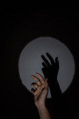 hands in the dark