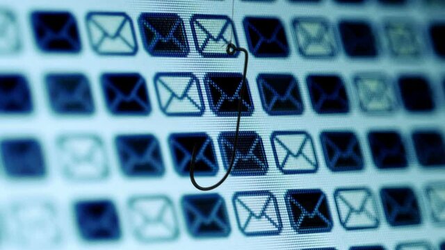 Fish hook against mail bacround phishing concept