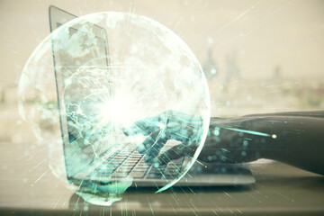 Double exposure of woman hands typing on computer and business theme hologram drawing. Success concept.
