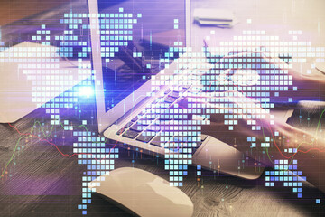 Double exposure of woman hands typing on computer and business theme hologram drawing. Success concept.