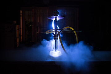 Hookah hot coals on shisha bowl with black background. Stylish oriental shisha. Shisha Concept