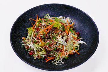 quinoa salad with bell peppers, avocado, beans and carrots