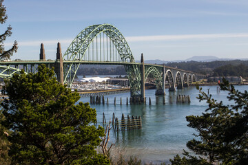 Yaquina Bay bridge in Oregon. Opened in 1936 on route 101 coast highway this stylized arch bridge passes over Yaquina Bay in Newport, Oregon 