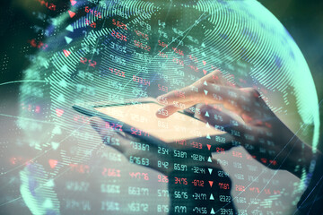Double exposure of business theme sketch hologram and woman holding and using a mobile device.