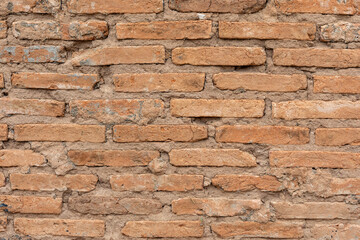 Exposed brick wall or wall, with apparent mortar. Texture for backgrounds