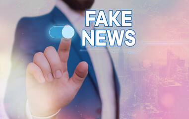 Handwriting text Fake News. Conceptual photo false content published without no credibility to...