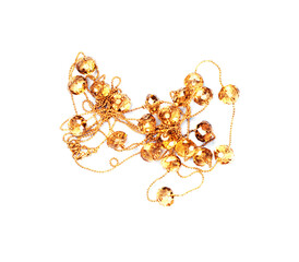 Tangled Necklace Jewelry in Amber or Gold Tones on White Background from Above View