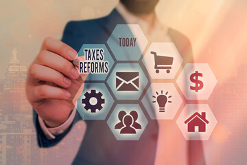 Conceptual hand writing showing Taxes Reforms. Concept meaning managing collected taxes in a more...