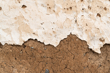 Old house wall falling apart texture background orange brown yellow white grunge space for text