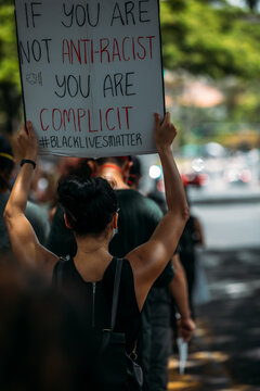 Honolulu, Hawaii, USA June-6-2020: Protesters In Masks Activists March With Signs Against Police Shootings And Racism, , Black Lives Matter BLM, 