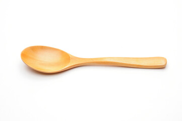 Wooden spoon on a white background