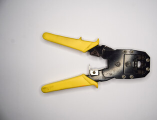 Adjustable wire stripper isolated isolated a white background, Wire stripper on white, Internet cable adjustment tool, crimping tool. modern technology concept.
